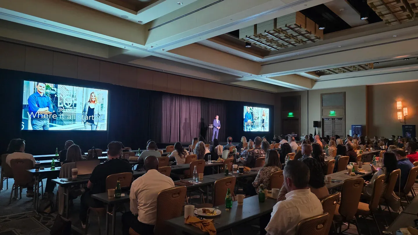 Practice Empowered conference with over 100 attendees and dual presentation screens
