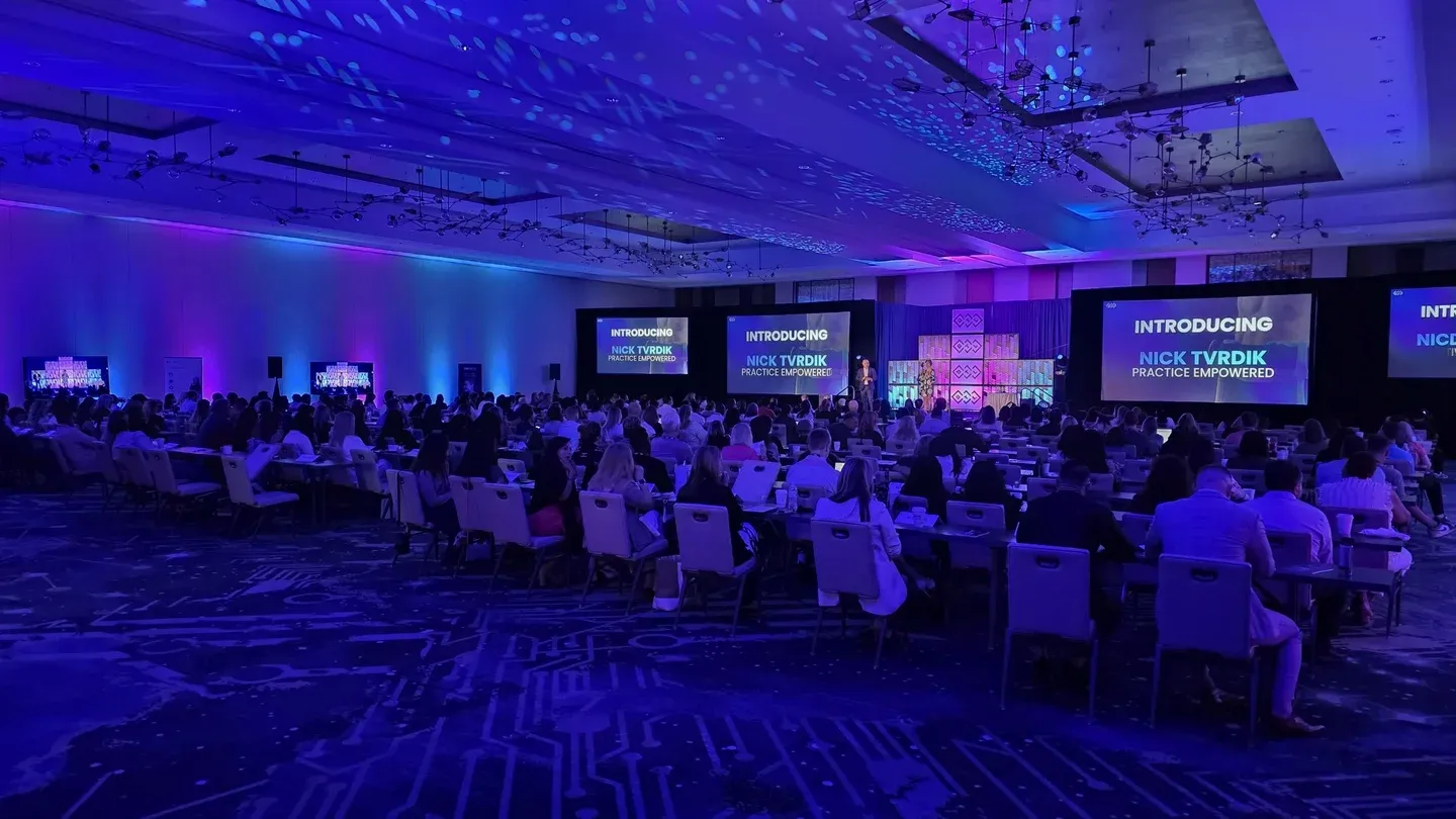 Practice Empowered conference ballroom introducing Nick Tvrdik
