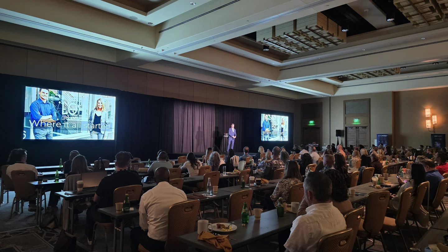 Practice Empowered conference with over 100 attendees and dual presentation screens