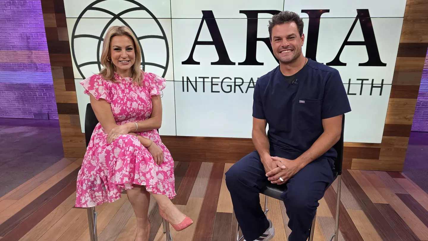 Nick and Stephanie on set